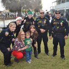 Officers and families take time out for a photo Thursday.